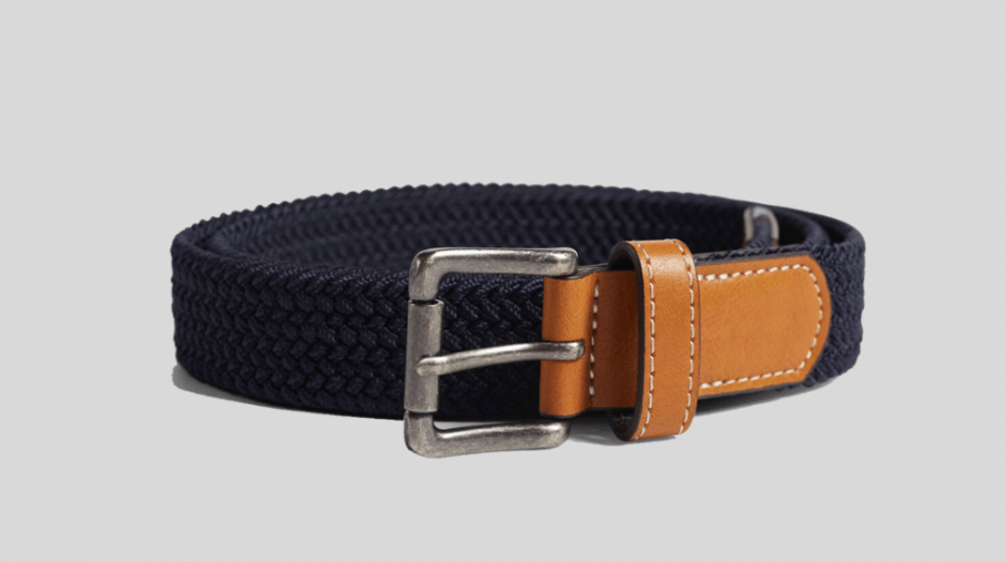 Navy braided stretch belt with tan leather tip and antique silver buckle