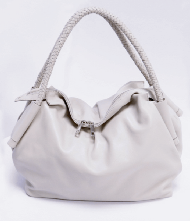 Cream leather slouchy hobo bag with braided shoulder strap and dual zippers