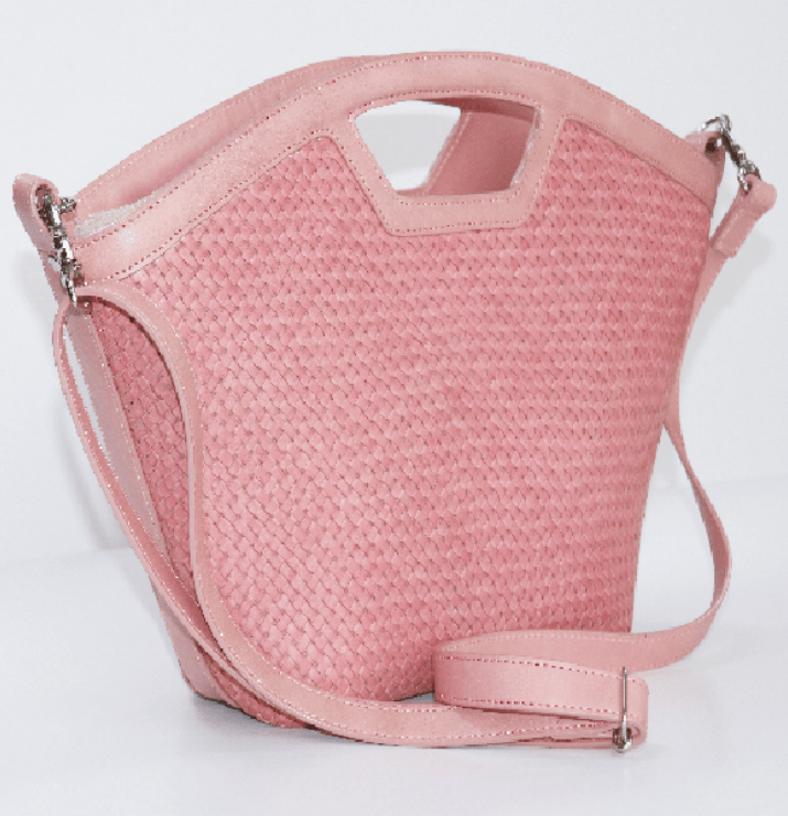 Dusty pink woven bucket bag with cutout top handle and detachable strap
