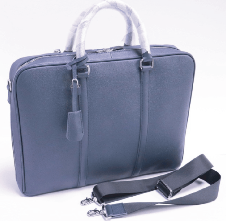 Navy blue slim leather briefcase with top handles and detachable shoulder strap