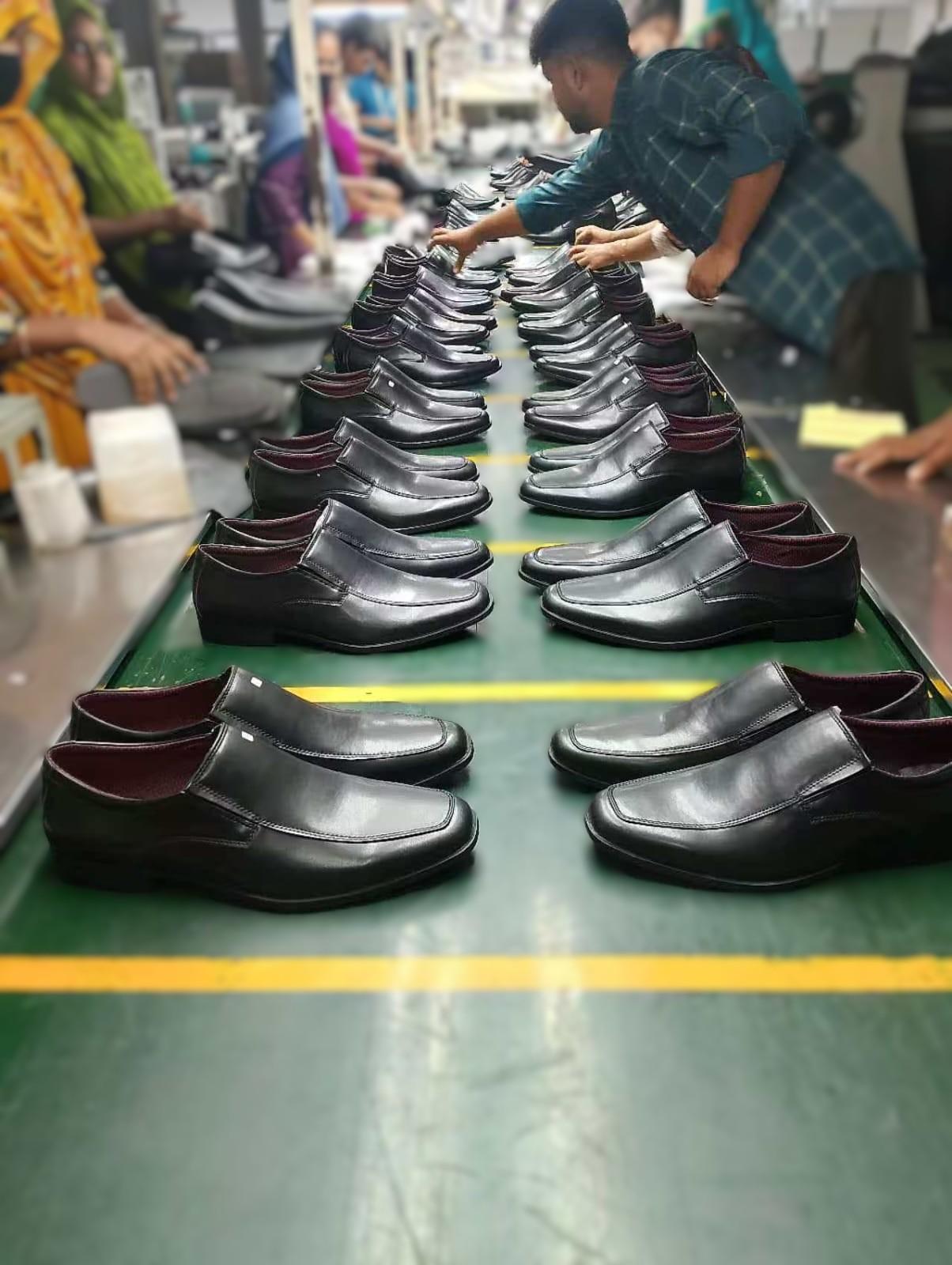 Footwear production line with craftsmanship across the factory floor
